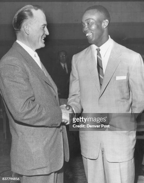 Dan Thornton welcomes Monte Irvin back to Denver. Both spoke at Old Timers banquet, helping fill time alloted to Durocher. Irvin, Monte Gov. Dan...