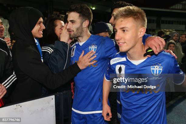 Brad Norton and Jesse Daley of South Melbourne of South Melbourne celebrate the win with fans during the FFA Cup round of 16 match between between...