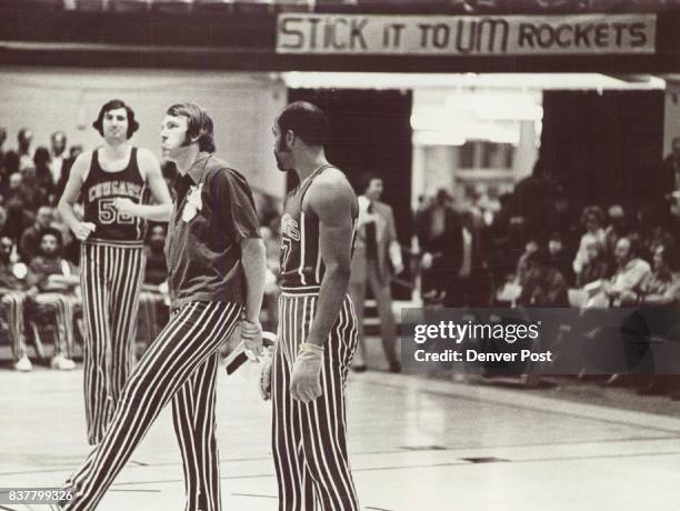 Caldwell, Joe Coldwell, Wearing gloves during player intro. Stickum? What Stickum? Carolina's Joe Caldwell, right, accused recently by Denver Rockets...