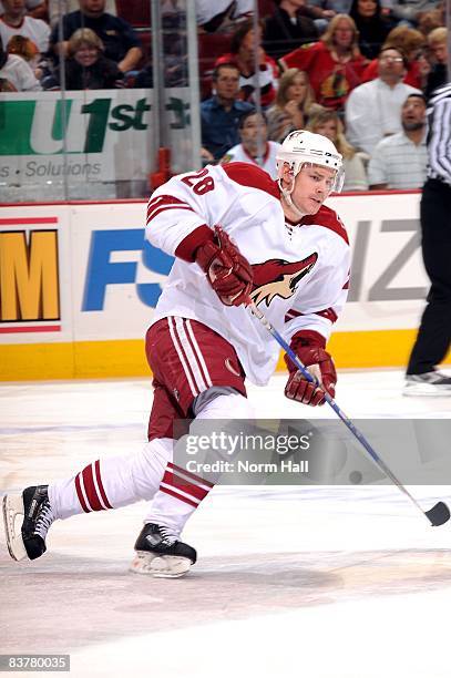 Steven Reinprecht of the Phoenix Coyotes skates up ice against the Chicago Blackhawks on November 18, 2008 at Jobing.com Arena in Glendale, Arizona.