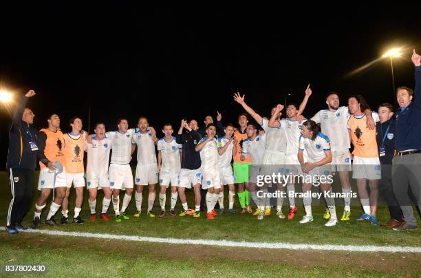 Gold Coast City celebrate their victory after the FFA Cup round of 16 match between Moreton Bay United and Gold Coast City at Wolter Park on August...