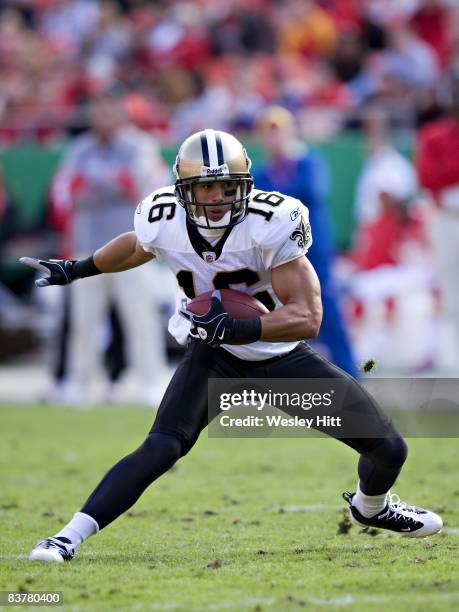 Lance Moore of the New Orleans Saints runs with the ball after catching a pass against the Kansas City Chiefs at Arrowhead Stadium on November 16,...