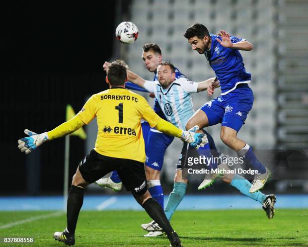 Kristian Konstantinidis of South Melbourne heads the ball during the FFA Cup round of 16 match between between South Melbourne FC and Sorrento FC at...