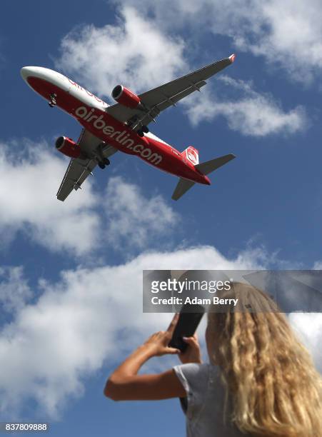 An Air Berlin airplane lands at Tegel Airport on August 23, 2017 in Berlin, Germany. Air Berlin's creditors are meeting to discuss acquisition of the...