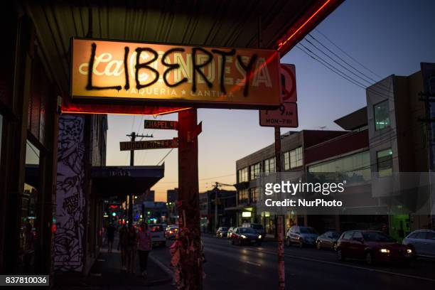 Melbourne, Australia, 18 march 2017. A view of a shop sign tagged with de word liberty in a street of the Fitzroy district. Melbourne is ranked as...