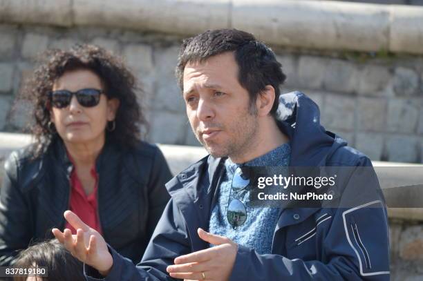 Cenk Yigiter, a former academic of Ankara University who was sacked by a decree-law of the state of emergency, speaks during an outdoor lecture in...