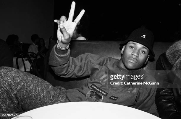 American rapper and actor LL Cool J flashes a peace sign at a record release party for Run DMC's album "Tougher than Leather" at the Palladium on...
