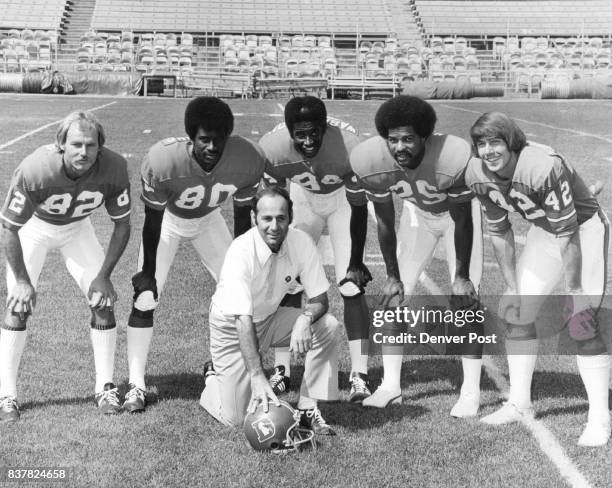 Coury, Dick Denver Bronco Receiver Coach Bronco Receiver Coach Dick Coury's Corps Left to right are Jerry Simmons, Gene Washington, Haven Moses,...