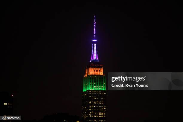 The Empire State Building is lit up in FedEx colors to commemorate the beginning of THE NORTHERN TRUST and the FedEx Cup Playoffs on August 22, 2017...