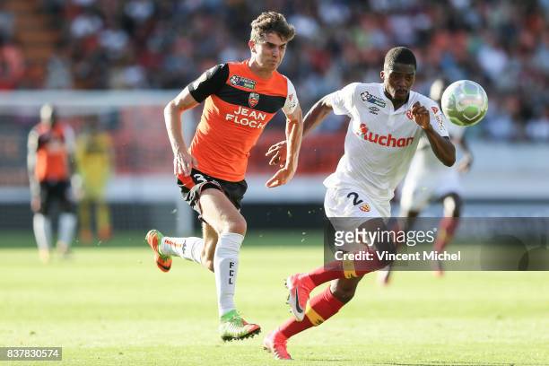 Pierre-Yves Hamel of Lorient and Jean-Kevin Duverne of Lens during the French League Cup match between FC Lorient and RC Lens at Stade du Moustoir on...