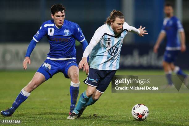 Daryl Platten of Sorrento controls the ball from Matthew Millar of South Melbourne during the FFA Cup round of 16 match between between South...