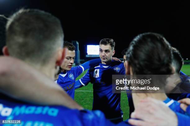 South Melbourne players huddle during the FFA Cup round of 16 match between between South Melbourne FC and Sorrento FC at Lakeside Stadium on August...