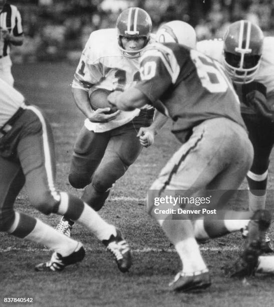 Denver Broncos Bob Anderson, No. 11, Tackled By Charger Bob Babich, No. 60 Credit: Denver Post