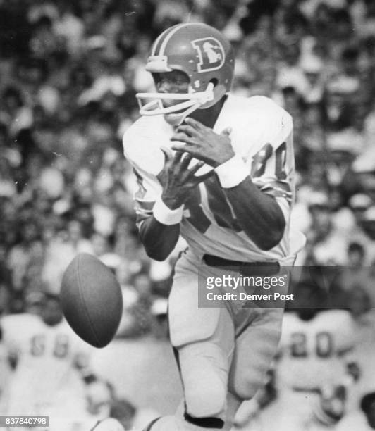 Denver Broncos It was this kind of day for Broncos Rick Upchurch, who later caught touchdown pass, drops this one at Buffalo. Credit: Denver Post,...