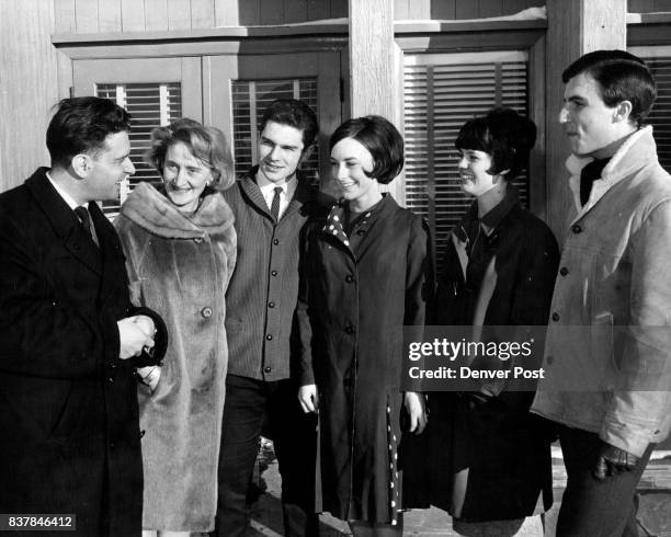 Coach Carlo Fassi and Jean Westwood are pictured with four Broadmoor Skating Club members as the group arrived in Berkeley, Calif., for the National...