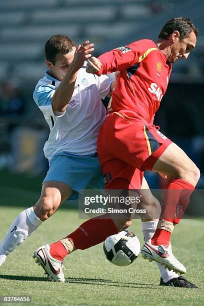 Michael Valkanis of United competes with Sean Rooney of Sydney during the round nine National Youth League match between Adelaide United and Sydney...