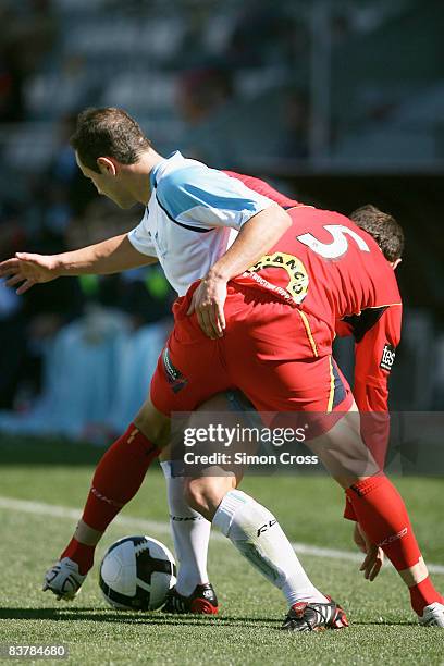 Michael Valkanis of United competes with Sean Rooney of Sydney during the round nine National Youth League match between Adelaide United and Sydney...