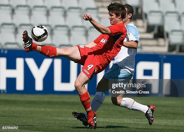Michael Marrone of United kicks the ball over his head during the round nine National Youth League match between Adelaide United and Sydney FC at...