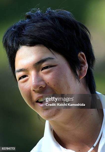 Ryo Ishikawa of Japan reacts to a putt on the 18th green during the third round of the Dunlop Phoenix Tournament 2008 at Phoenix Country Club on...