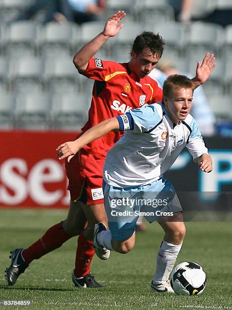 Sam Munro or Sydney dribbles the ball during the round nine National Youth League match between Adelaide United and Sydney FC at Hindmarsh Stadium on...