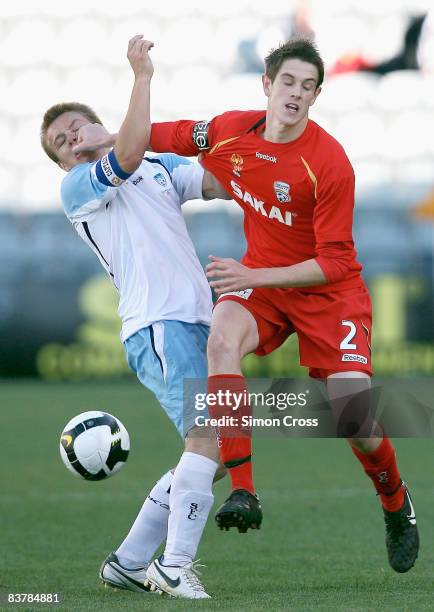Michael Doyle of United pushes off Sam Munro of Sydney during the round nine National Youth League match between Adelaide United and Sydney FC at...