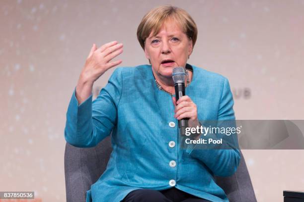 German Chancellor Angela Merkel speaks during "Germany Live: Where does the West go?" at the Westhafen Event & Convention Center on August 23, 2017...
