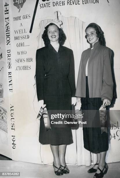 Here are the two winners of the 1949 dress revue in the girls' 4-H division of the Colorado State fair at Pueblo. At left is the grand champion, Ann...