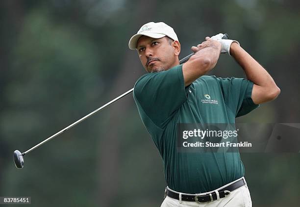 Jeev Milkha Singh of India plays his tee shot on the 13th hole during the third round of the UBS Hong Kong Open at the Hong Kong Golf Club on...