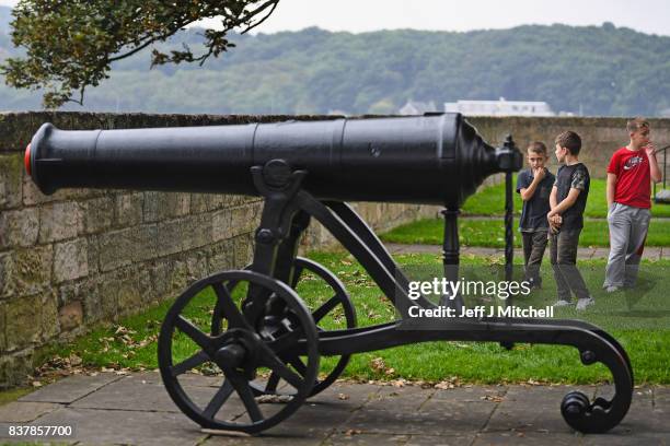 Boys view the Sebastapol canon returned to the town walls on August 23, 2017 in Berwick-upon-Tweed, England.English Heritage's only Russian cannon,...