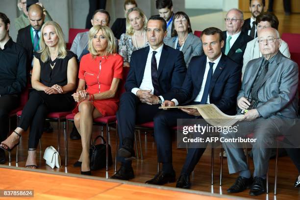 French President Emmanuel Macron , Austrian Chancellor Christian Kern and their their wifes Brigitte Macron and Eveline Steinberger-Kern listen in...