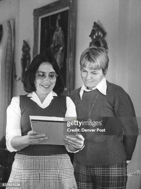 Scanning the invitation list are Mrs. Leonard Kapelovitz, left, and Mrs. John Nawn. However, the $8 seminar box luncheon program is open to general...