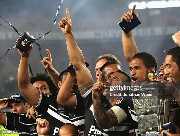 Manu Vatuvei and David Fa'alogo of the Kiwis celebrate victory during the 2008 Rugby League World Cup Final match between the Australian Kangaroos...