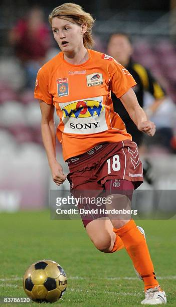 Courtney Beutel of the Roar dribbles the ball during the round five W-League match between the Queensland Roar and the Melbourne Victory at Spencer...