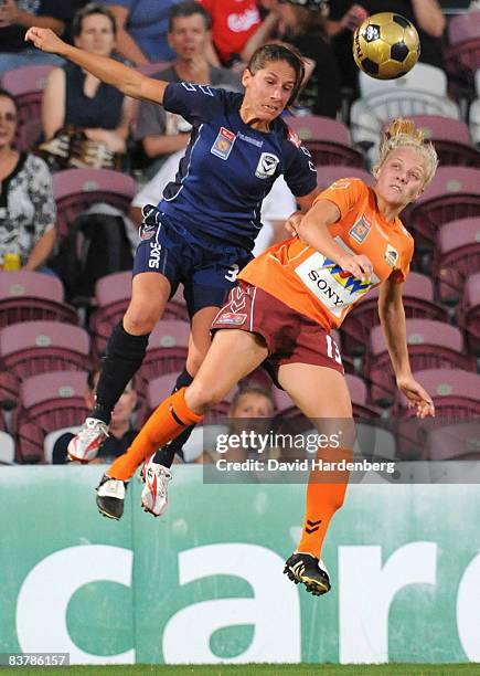 Marlies Oostdam of Victory and Tameka Butt of the Roar compete for the ball during the round five W-League match between the Queensland Roar and the...