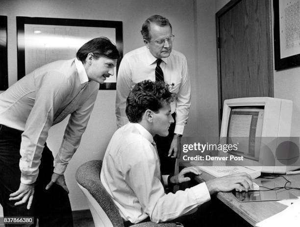 Cadnetix Stephan Rozanski, Softwre Engineer for Computer Consoles Inc and Godeon Allen, Glasses, Manager of Computer aided Design for the same...
