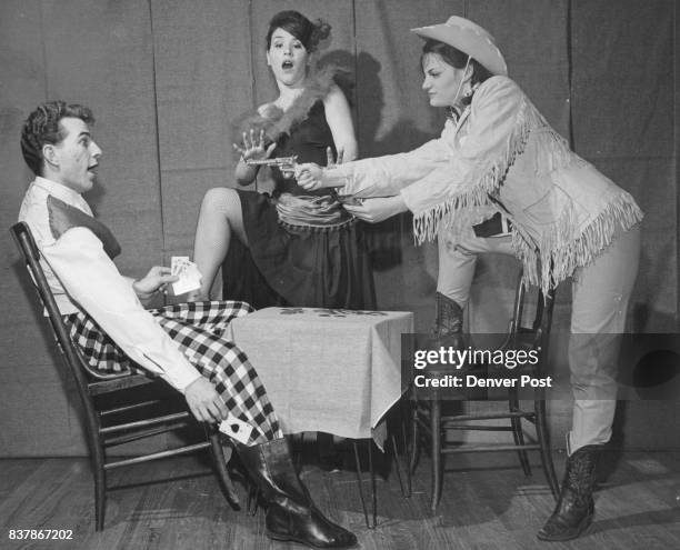 Sandy McDoan, the gambler is surprised when Calamity Jane discovers him cheating at cards and gives him his desserts. Dancehall Rose throws up her...