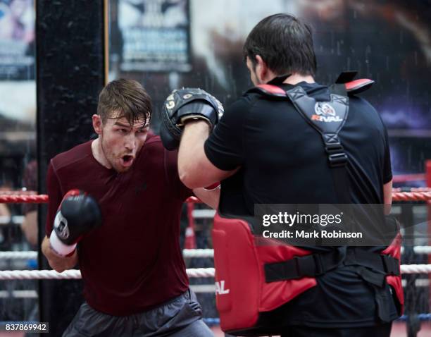 Callum Smith takes part in a training session with his trainer Joe Gallagher at Gallaghers Gym on August 23, 2017 in Bolton, England.