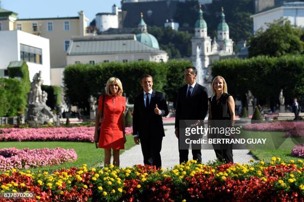French President Emmanuel Macron and his wife Brigitte Macron pose for a group photo with Austrian chancellor Christian Kern and his wife Eveline...