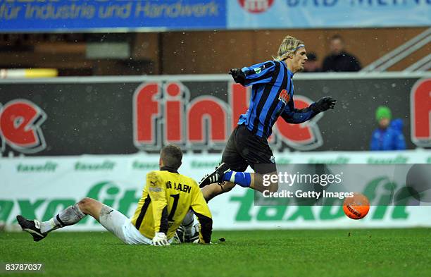 Goalkeeper Tobias Linse of Aalen stopps Soeren Brandy of Paderborn during the 3. Bundesliga match between SC Paderborn and VFR Aalen at the Paragon...