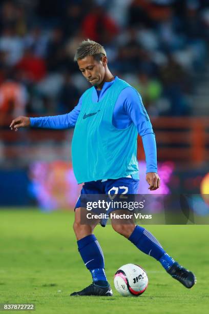 Keisuke Honda of Pachuca warms up at the end of the first half during the sixth round match between Pachuca and Veracruz as part of the Torneo...