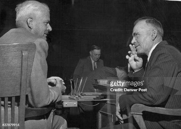 Two freshmen senators compare notes: George Wilson of Nucla and Clarence B. Hocker of Monte Vista . Credit: The Denver Post