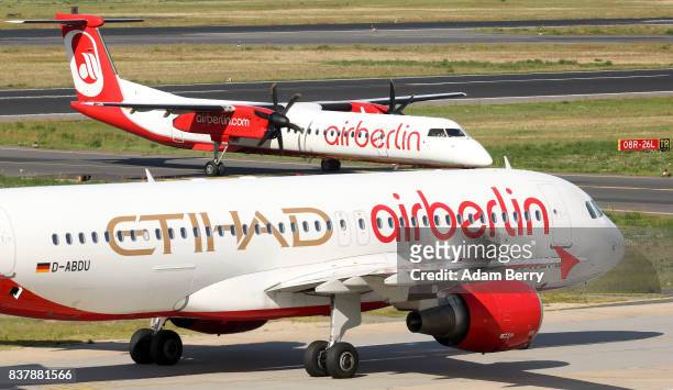 Etihad and Air Berlin airplanes are seen on the tarmac at Tegel Airport on August 23, 2017 in Berlin, Germany. Air Berlin's creditors are meeting to...