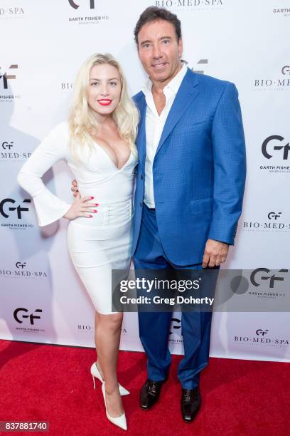 Recording Artist and Actress Grace Valerie and Dr. Garth Fisher attend the Official Launch Party Of Dr. Garth Fisher's BioMed Spa at Garth Fisher MD...