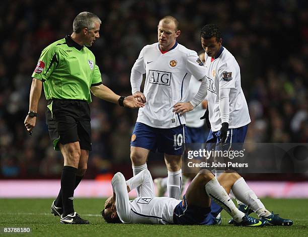 Cristiano Ronaldo of Manchester United lies injured during the Barclays Premier League match between Aston Villa and Manchester United at Villa Park...