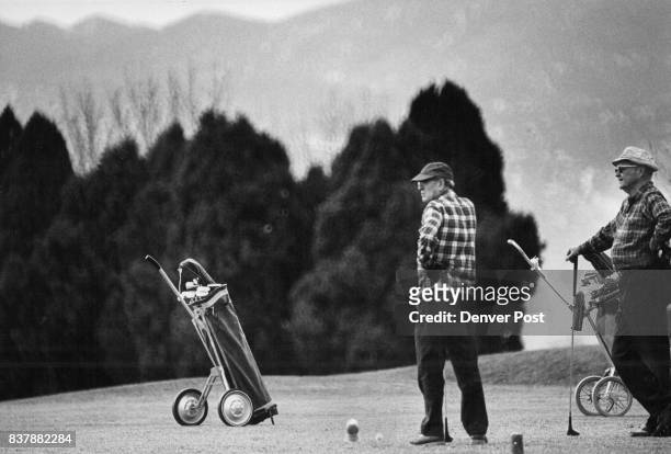 Golf is Also a winter Sport Thursday was a balmy springlike day in the Denver area wand ideal for playing golf as these men demonstrate at Willis...
