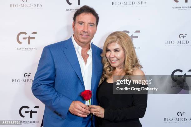 Dr. Garth Fisher and Janet Norraik attend the Official Launch Party Of Dr. Garth Fisher's BioMed Spa at Garth Fisher MD on August 22, 2017 in Beverly...