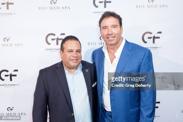 Marketing Director Joeb Nino and Dr. Garth Fisher attend the Official Launch Party Of Dr. Garth Fisher's BioMed Spa at Garth Fisher MD on August 22,...