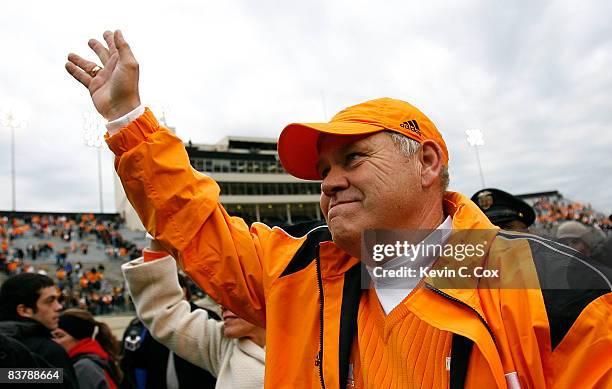 Head coach Phillip Fulmer of the Tennessee Volunteers waves to the fans as he celebrates their 20-10 win over the Vanderbilt Commodores at Vanderbilt...