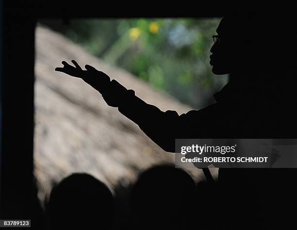 Rebel leader Laurent Nkunda speaks to a small crowd of local leaders in a house in the North Kivu town of Rutshuru on November 22, 2008. Earlier,...