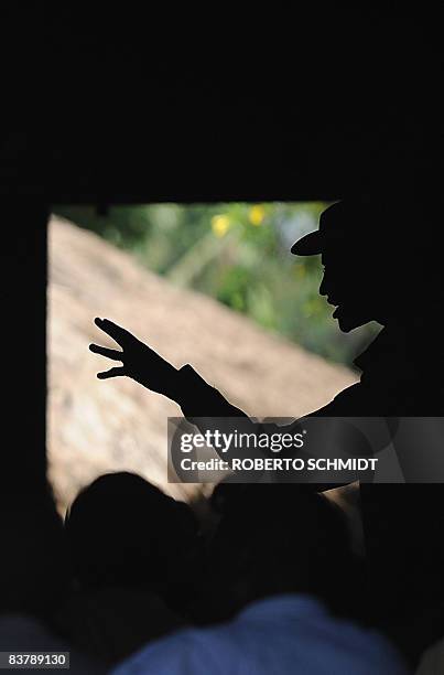 Rebel leader Laurent Nkunda speaks to a small crowd of local leaders in a house in the North Kivu town of Rutshuru on November 22, 2008. Earlier,...